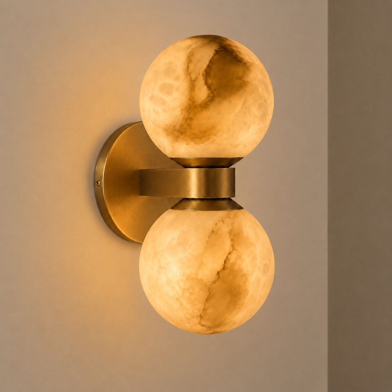 Luna dual-globe marble sphere wall lamp mounted on a wall