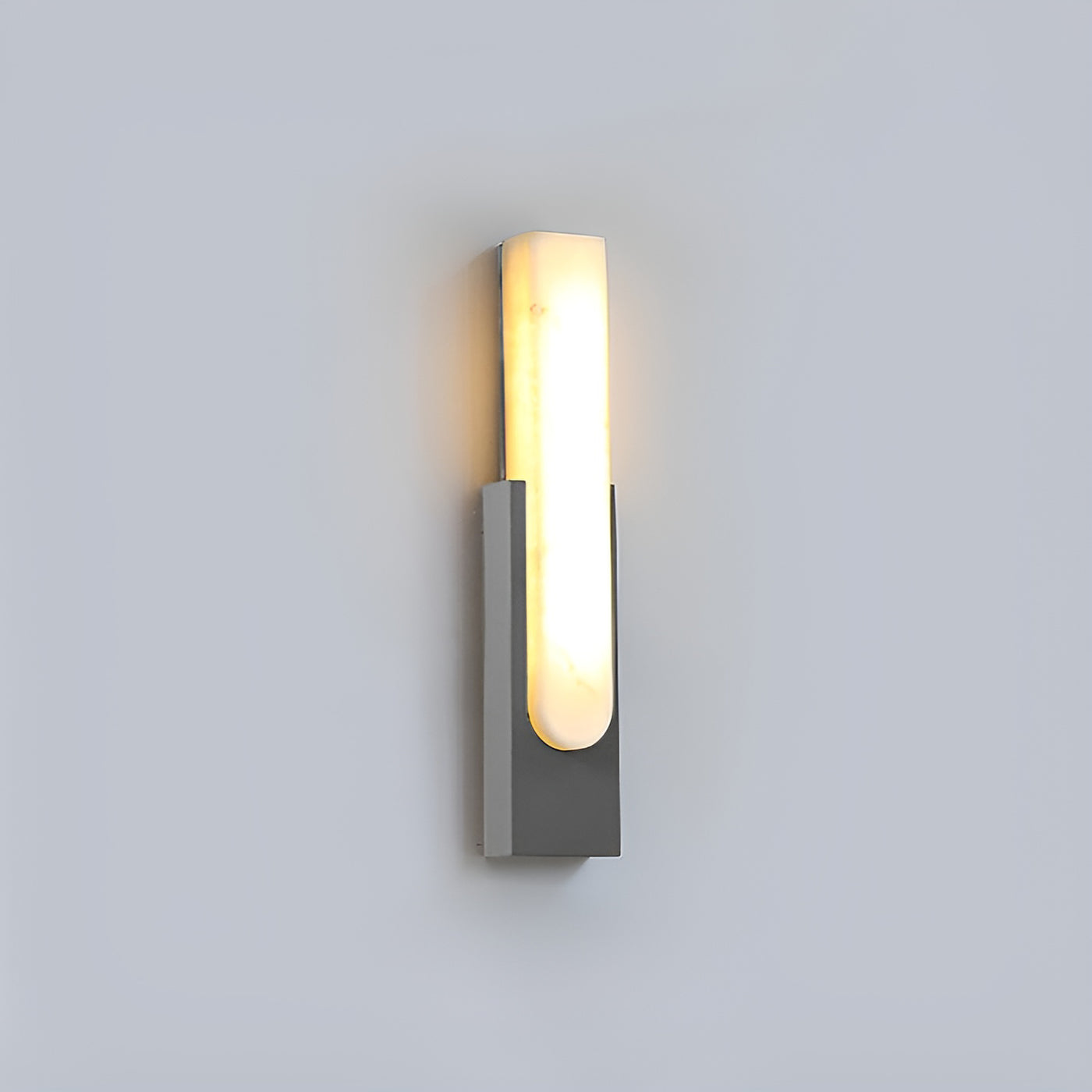 Mali alabaster LED wall sconce showing its slim 10cm (3.9in) wide vertical profile