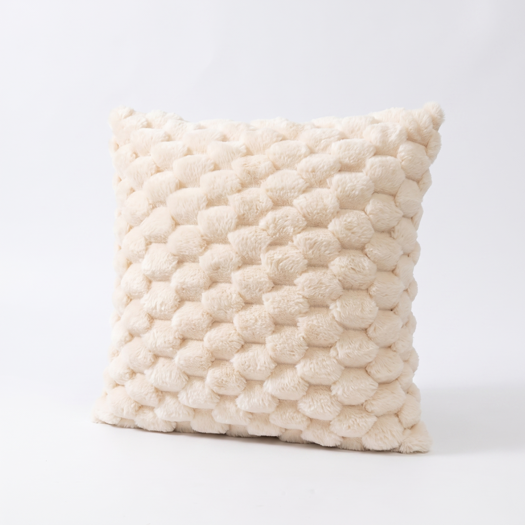 Maria plush 3D textured cushion cover in cream on a white background