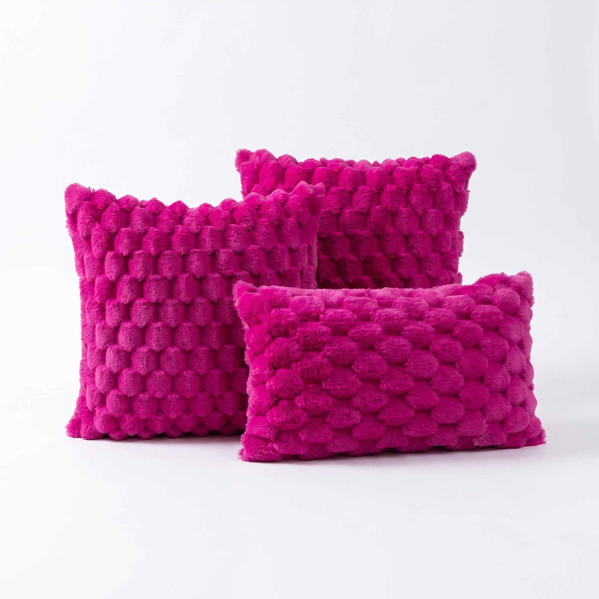 Maria plush 3D textured cushion cover in deep pink on a white background