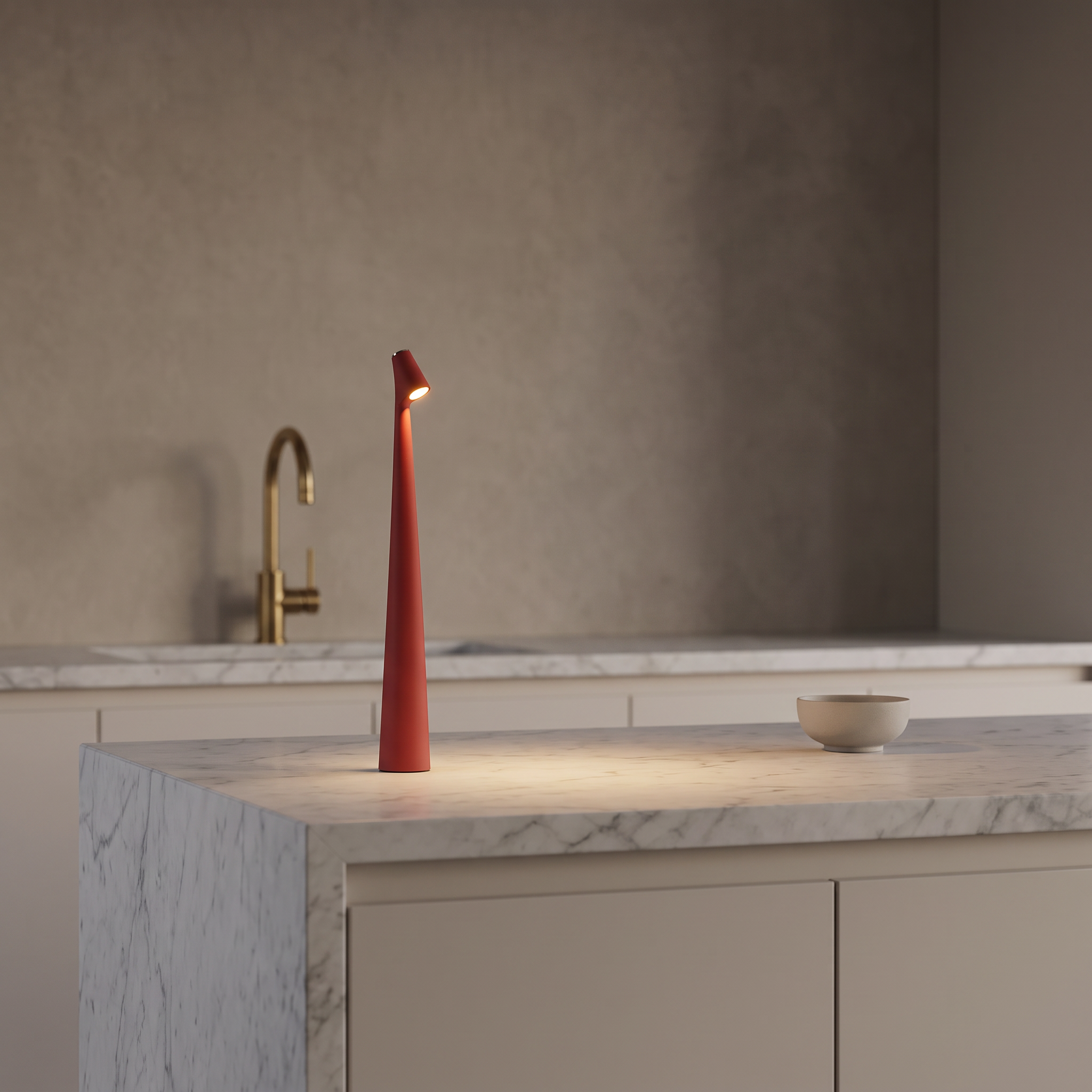 Massa cordless dimmable LED table lamp in Red on a marble kitchen island at night