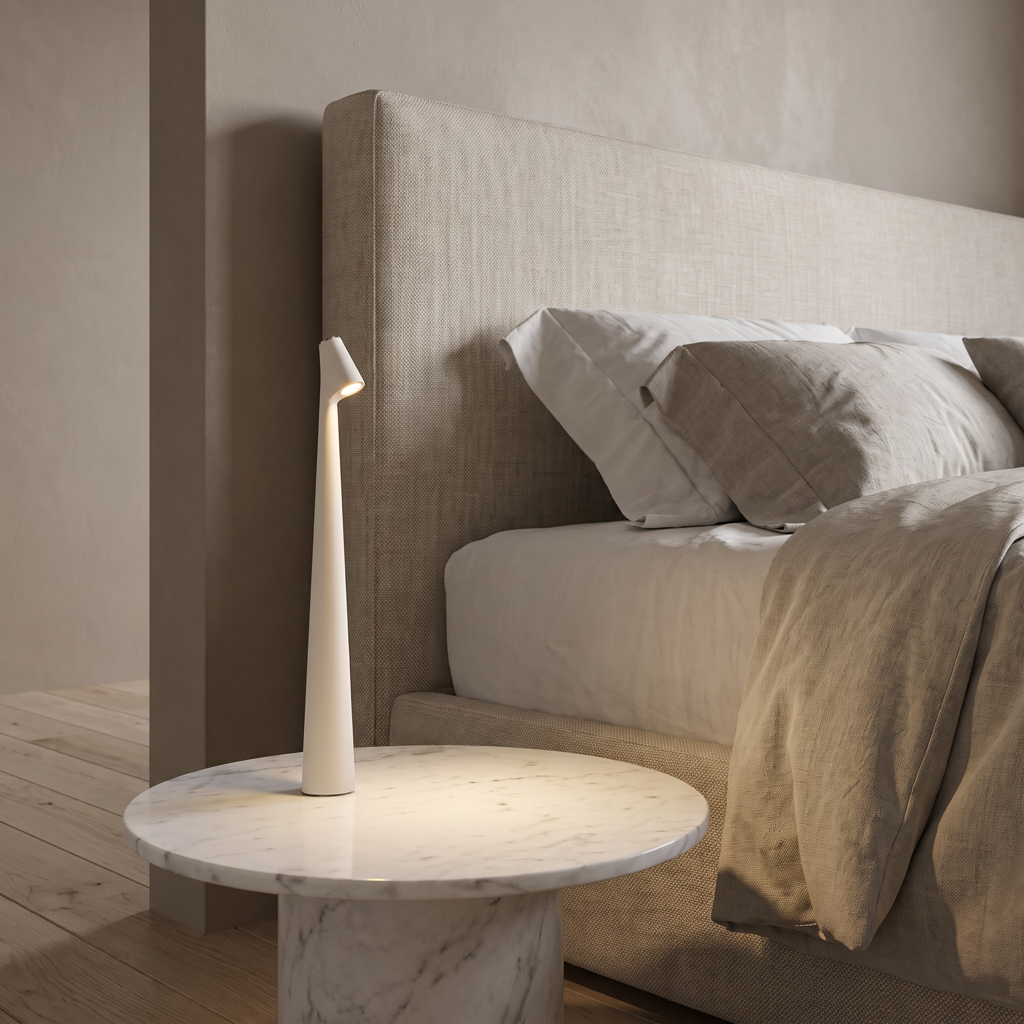 Massa cordless dimmable LED table lamp in White on a marble bedside table