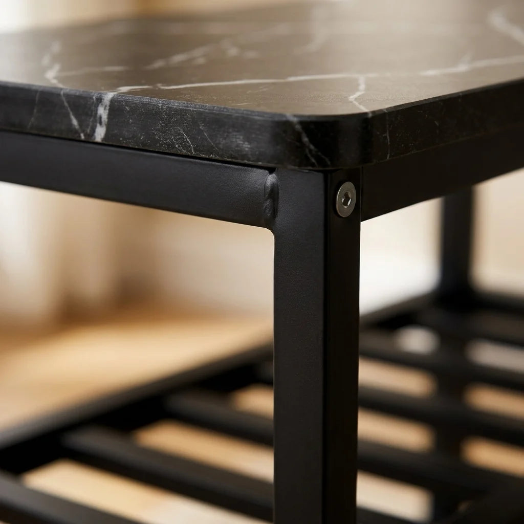 Close up of the Mata shoe rack corner showing the marble-look top and black steel joint