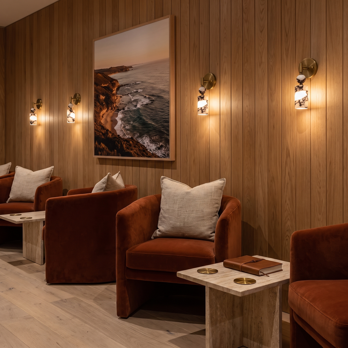 Matteo marble wall light on a timber panelled wall in a boutique hotel lounge bar