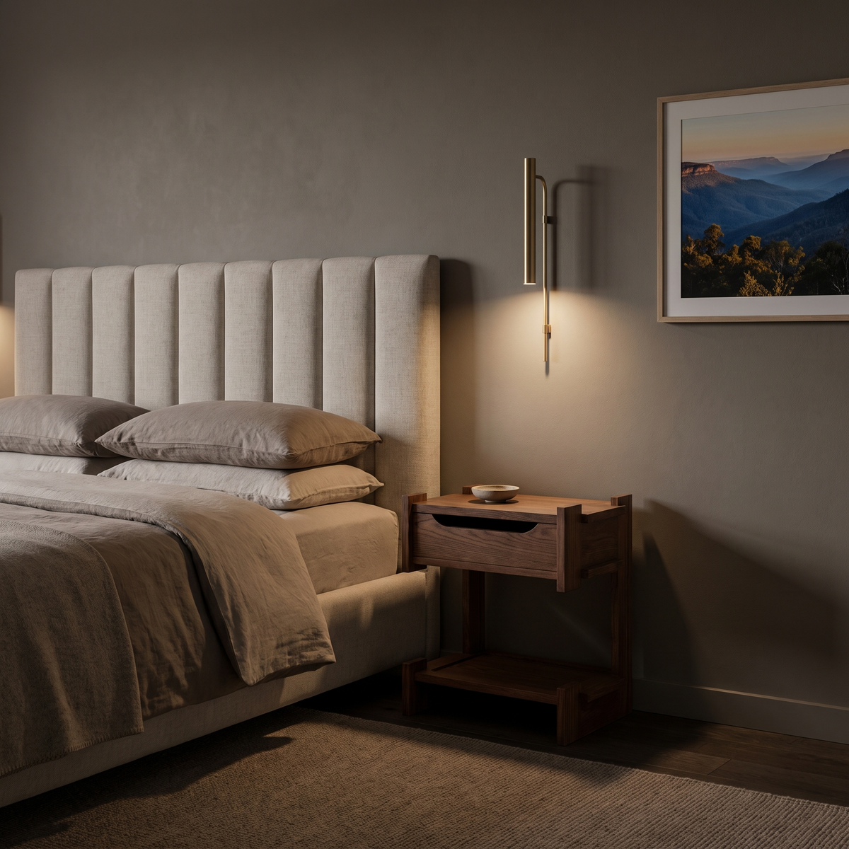 Mona Ash Wood Side Table with Drawer as a bedside table beside an upholstered linen headboard