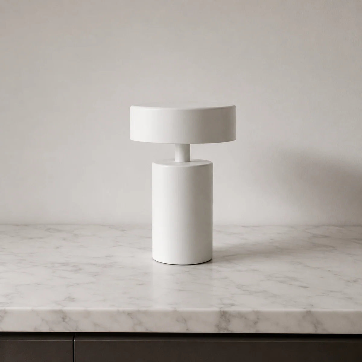 Mona portable LED lamp installed on outdoor entertaining table