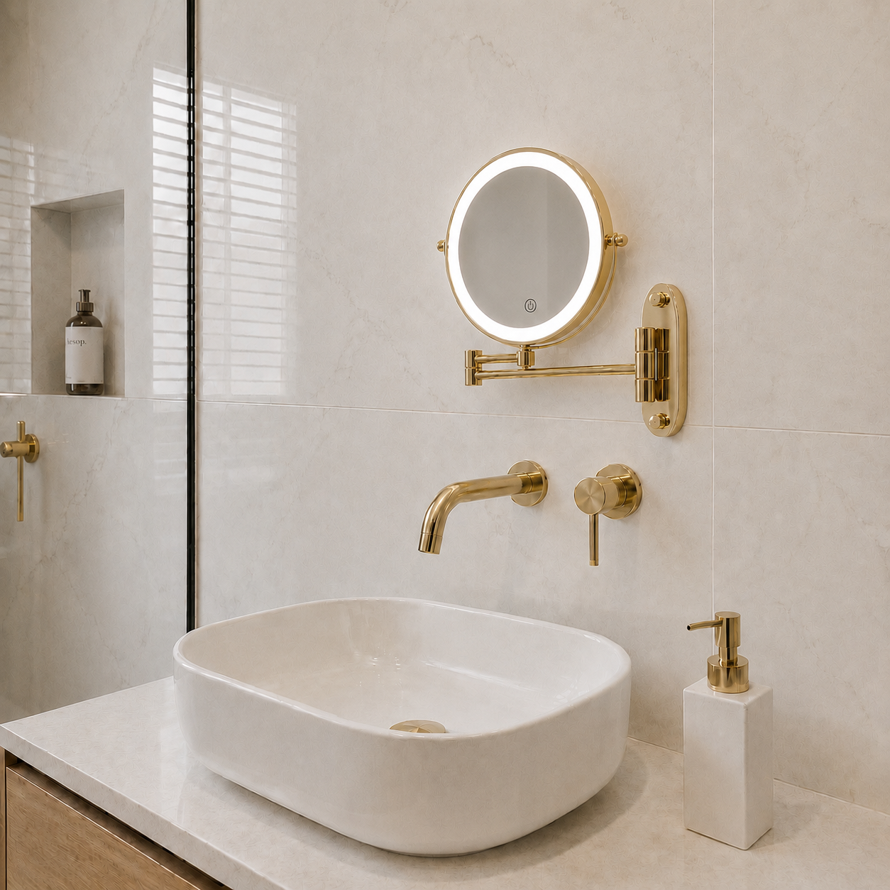 Nalen Magnifying Bathroom Mirror with a brushed gold finish