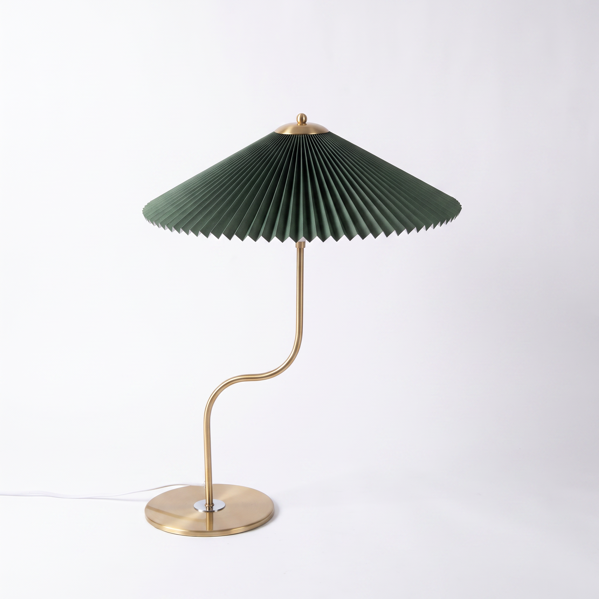 Newton retro checkered brass table lamp in green on a white background
