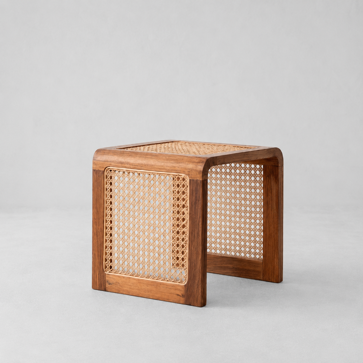 Nuggan Sculptural Solid Wood Side Table shown from a side angle highlighting its cubic silhouette