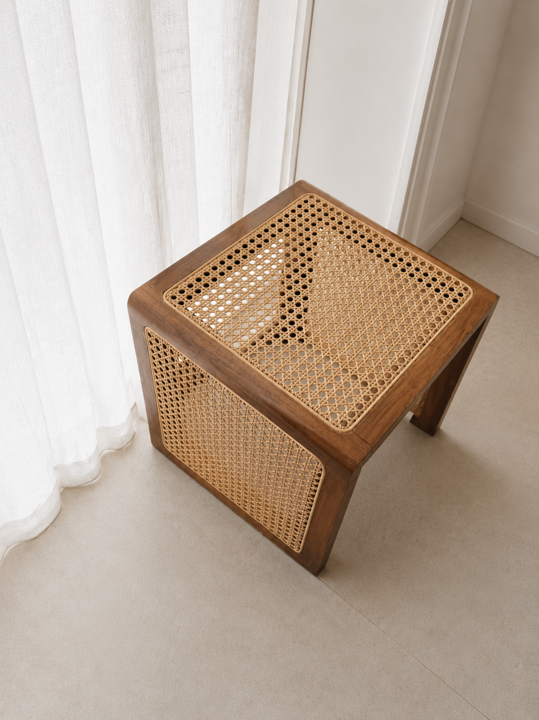 Nuggan Sculptural Solid Wood Side Table in a living room setting