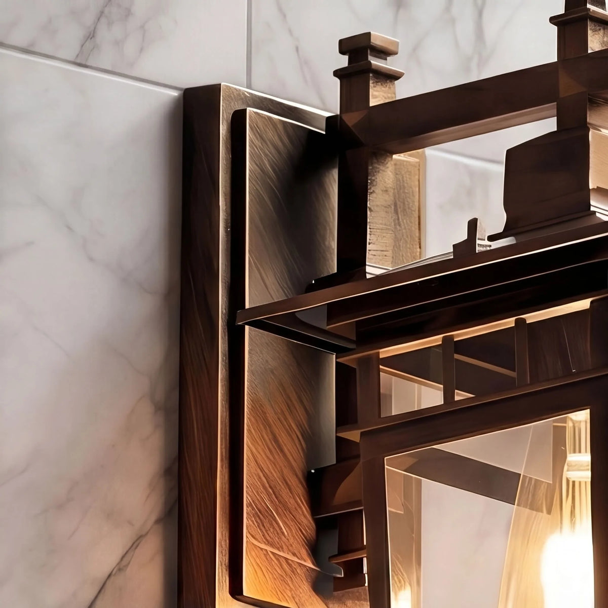 Detail of the Pica retro wall lantern bronze stepped roof, finial and wall bracket