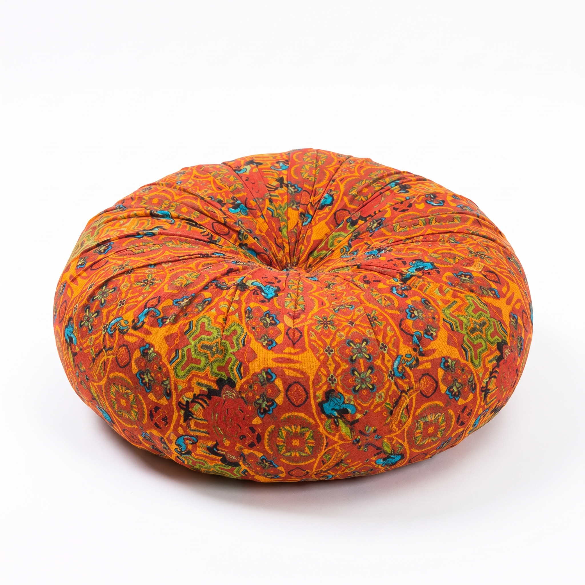 Rocio bohemian woven floor pillow in orange on a white background