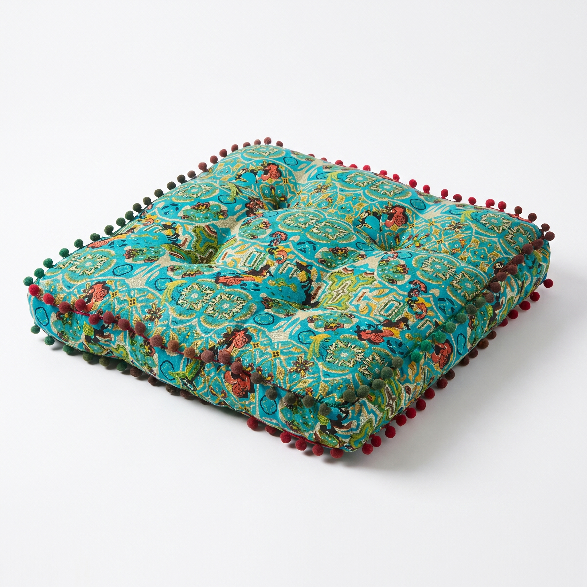 Rocio embroidered bohemian floor cushion in blue on a white background