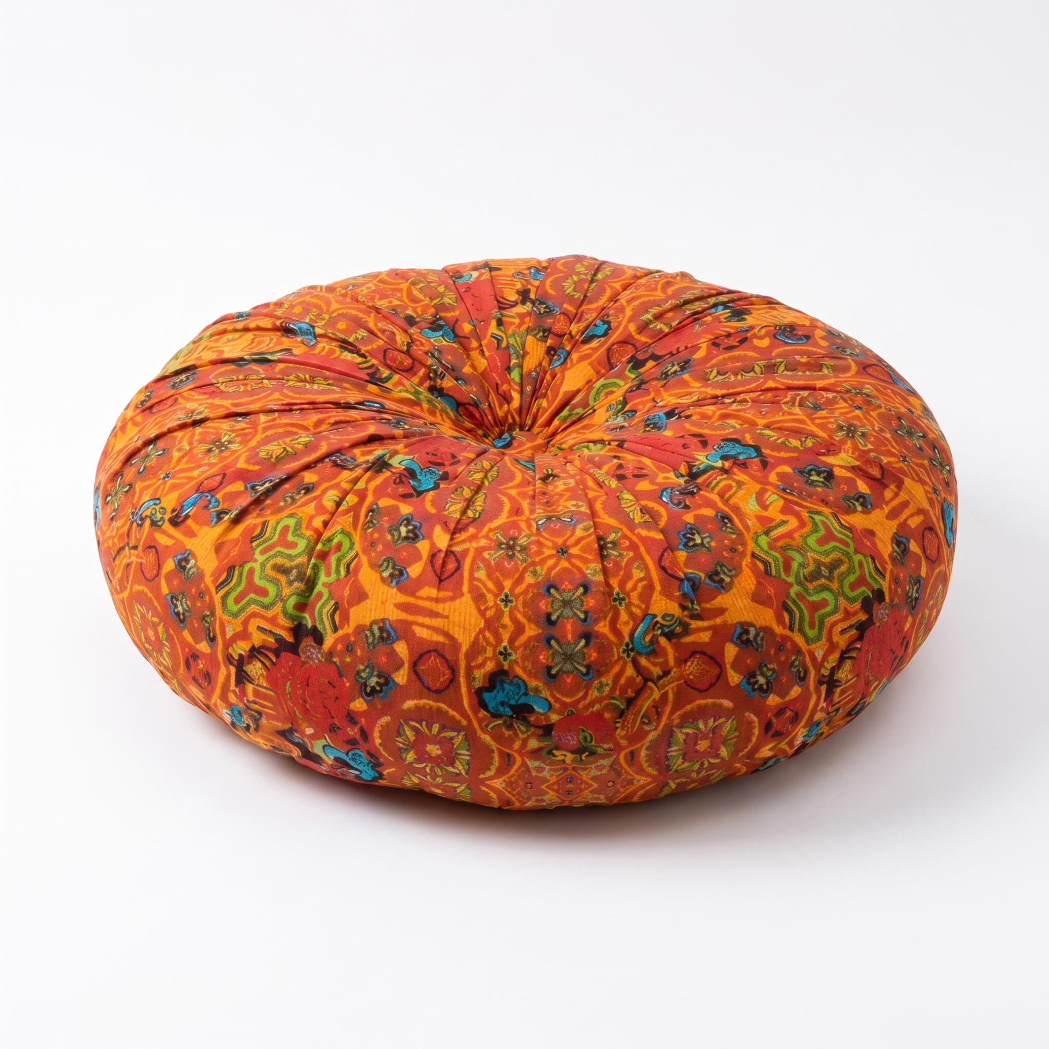 Round Rocio embroidered bohemian floor cushion in orange on a white background