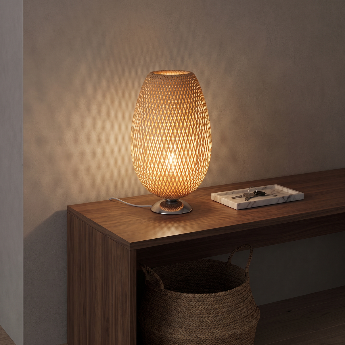Sabatu bamboo table lamp tall size with metal base glowing on a walnut entry console at dusk
