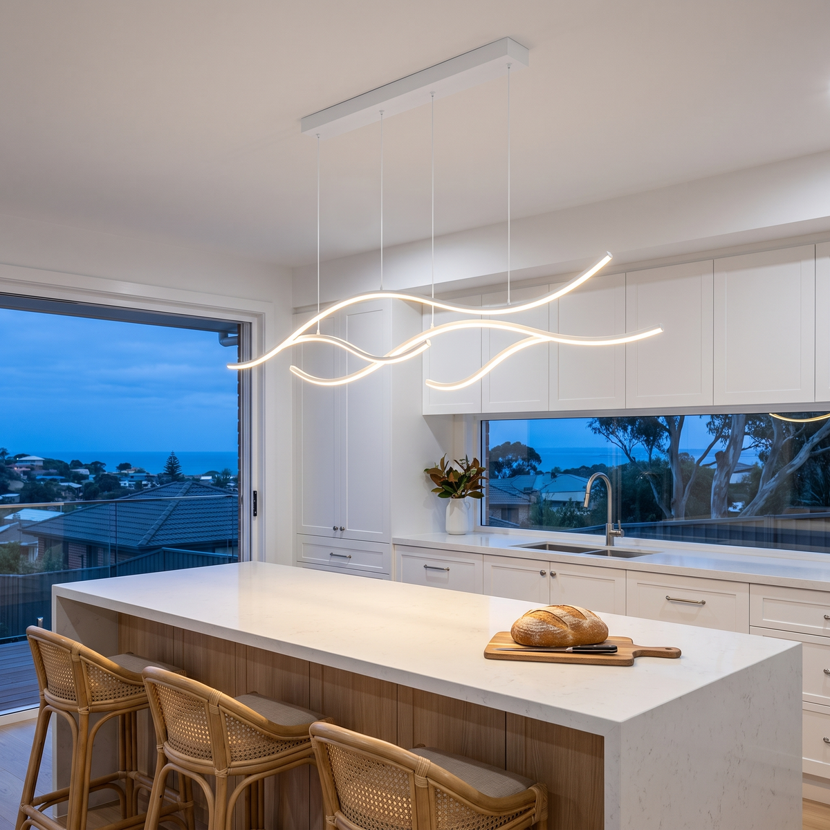 Soho white 120cm wave LED pendant light in a coastal kitchen