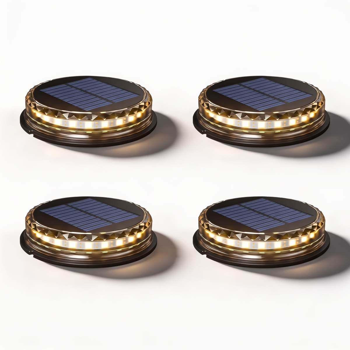 Set of four Stitch Outdoor Solar Garden Lights in black with warm white glow on a white background