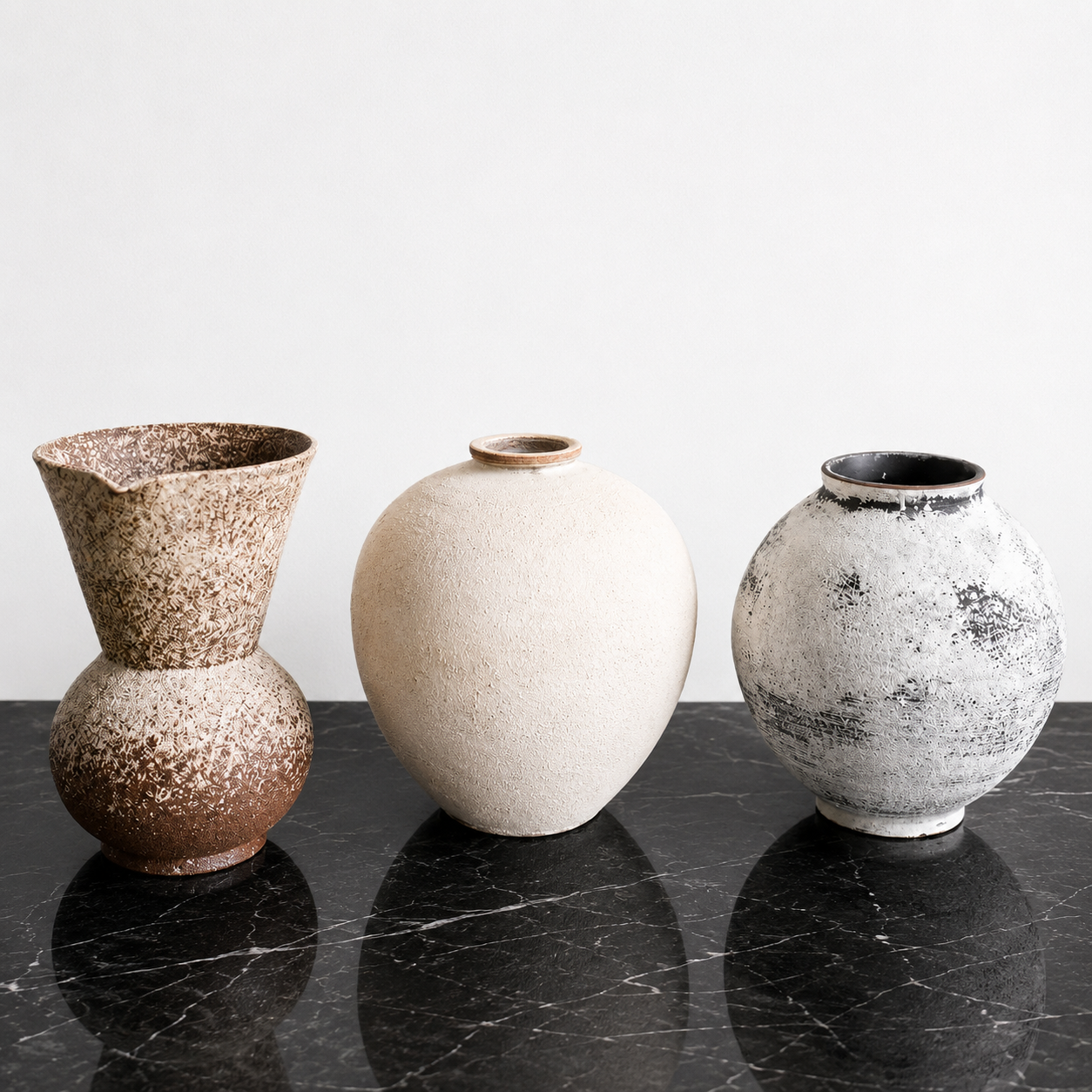 Tama Rustic Clay Vase displayed on a shelf, showcasing its handcrafted textured finish
