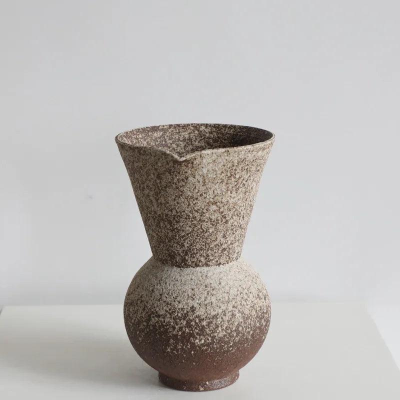 Tama Rustic Clay Vase in Brown displayed in a living room setting