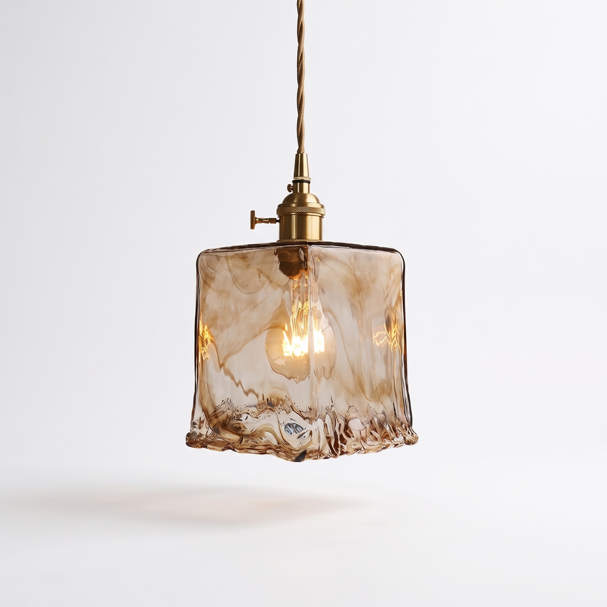 Tooky Model C square amber glass pendant with brass lamp holder on a plain white background