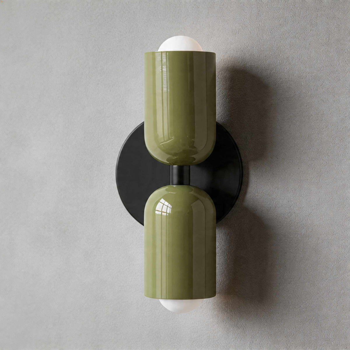 Vic Nordic up down wall sconce with a black wall plate and two green painted iron shades