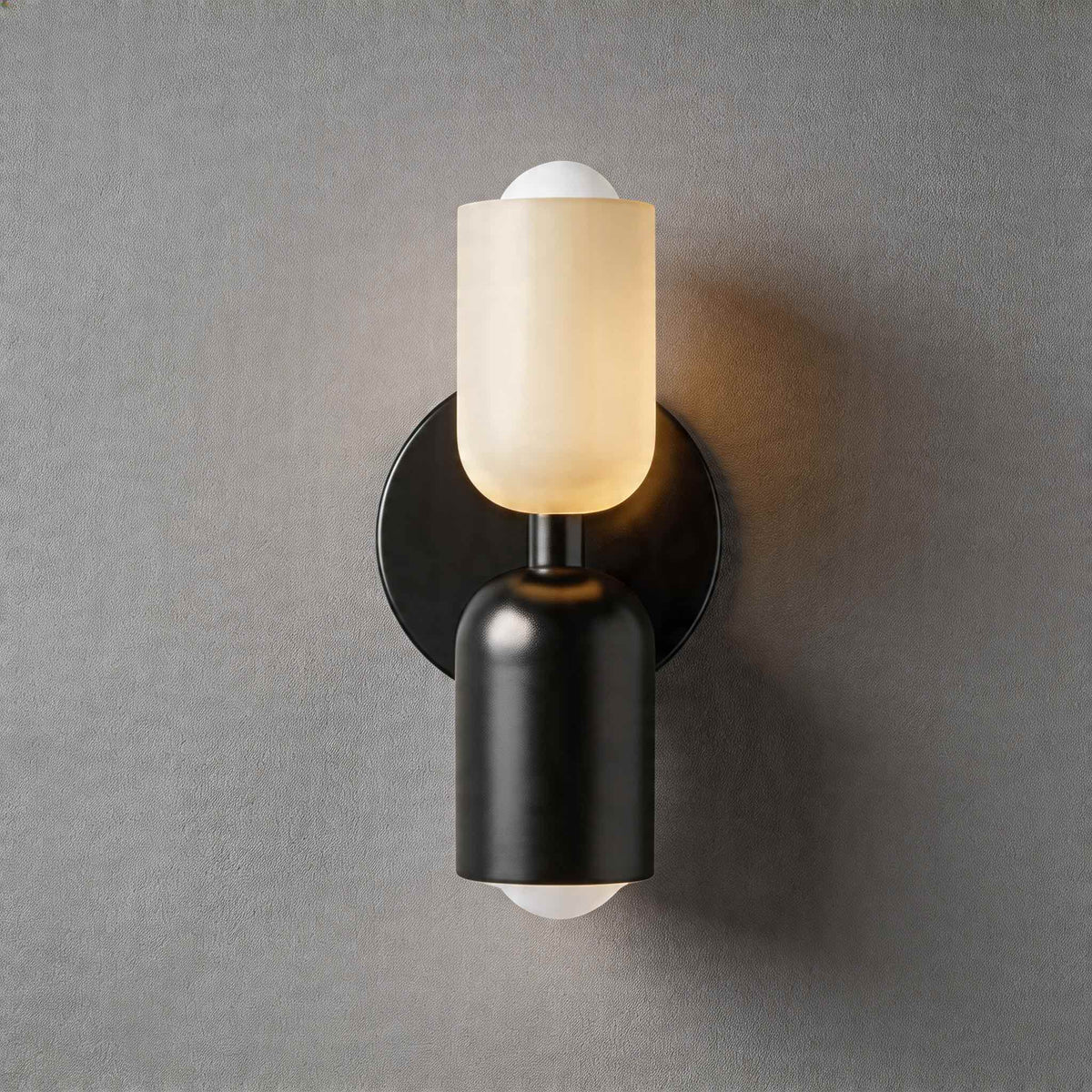 Vic Nordic up down wall sconce with a black wall plate, white upper shade and black lower shade