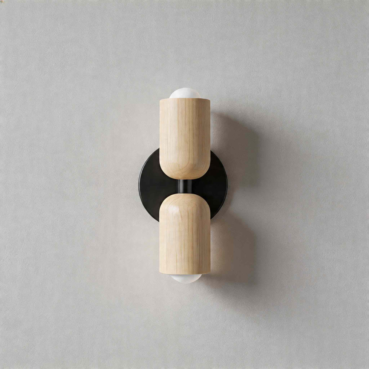 Vic Nordic up down wall sconce with a black wall plate and two white painted iron shades