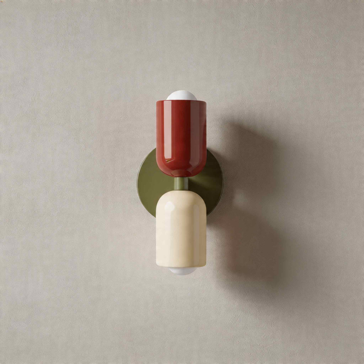 Vic Nordic up down wall sconce with a green wall plate, red upper shade and white lower shade