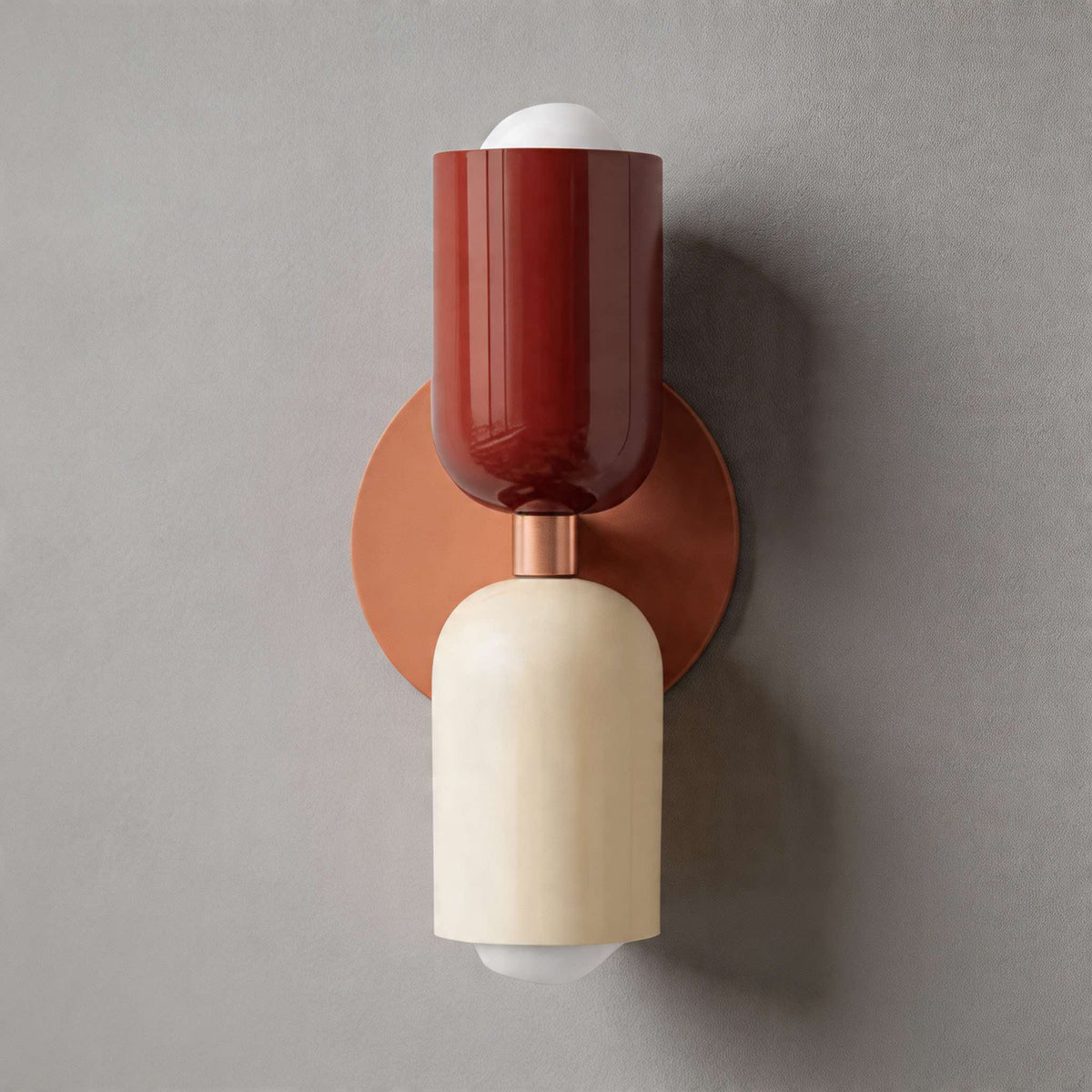 Vic Nordic up down wall sconce with a pink wall plate, red upper shade and white lower shade