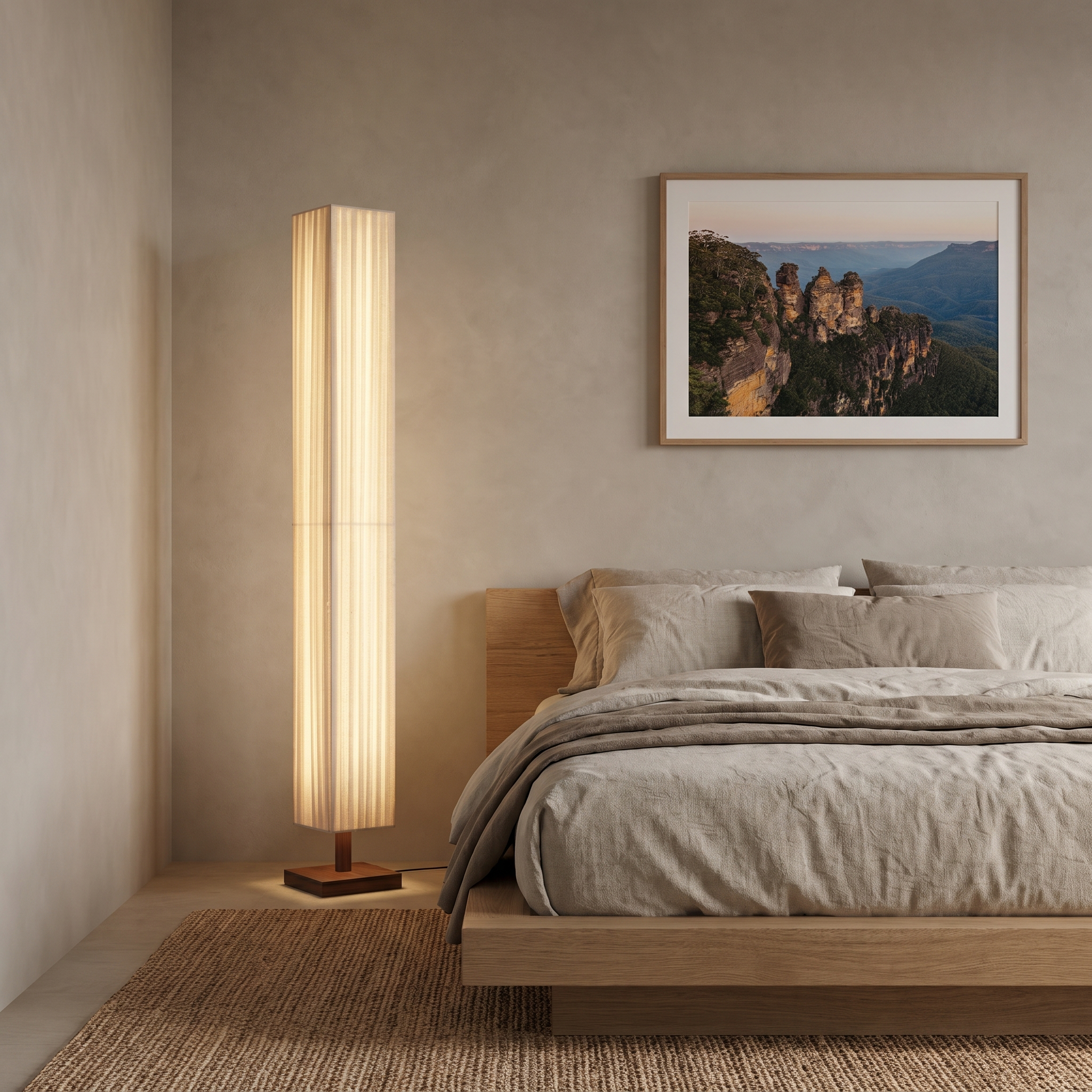 Yuki walnut floor lamp beside an oak platform bed in a warm Japandi bedroom