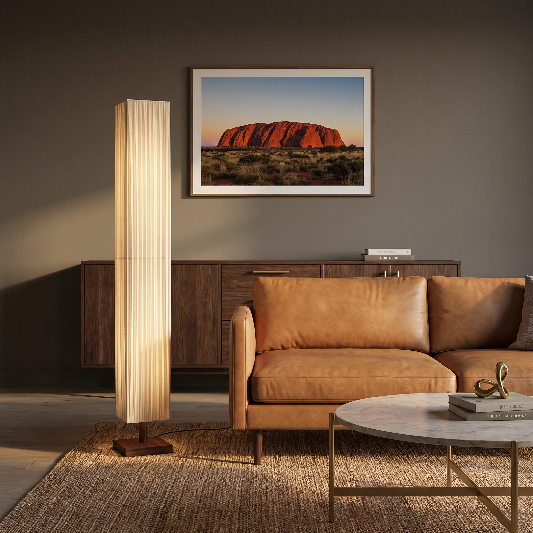 Yuki walnut floor lamp beside a leather sofa in a moody luxe living room