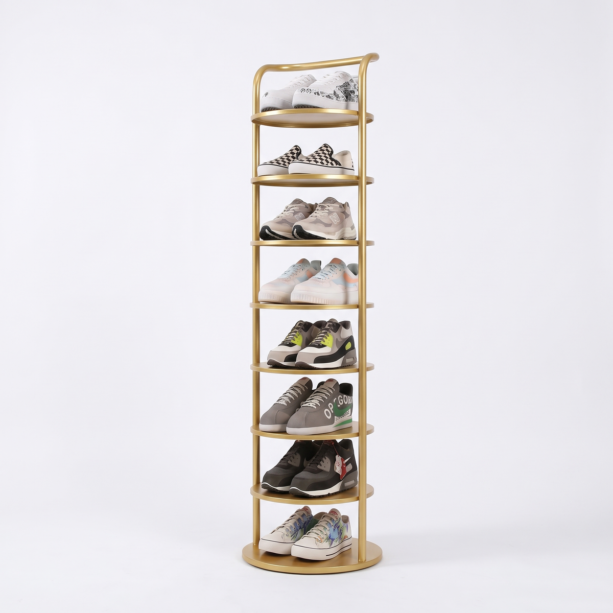 Zoe round shoe rack in gold with eight tiers of shoes on a white background